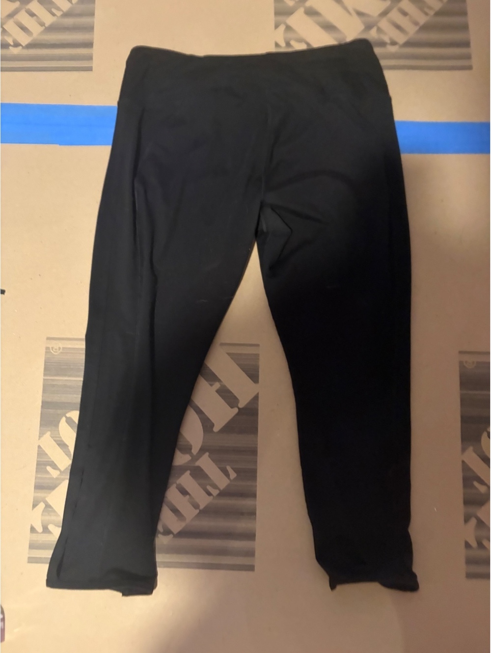 Cascade Sport black cropped leggings with side slit hem